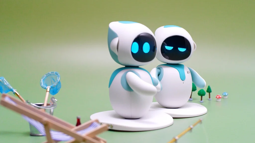 Two Eilik companion robots interacting together